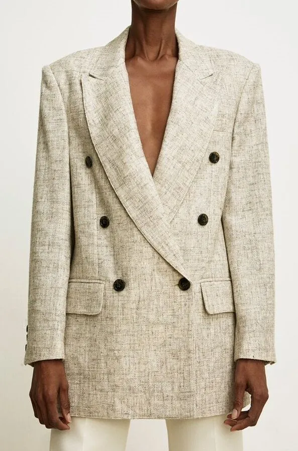 Women's tailored blazer back view with professional fit